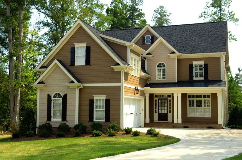 Exterior photo of a two story brown home